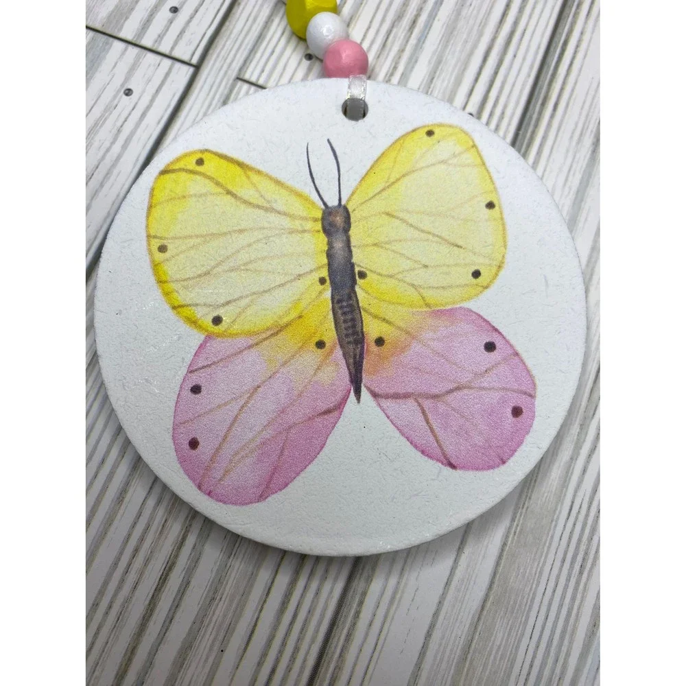 Wooden bead garland with butterfly print in spring tones /wooden spring garlands